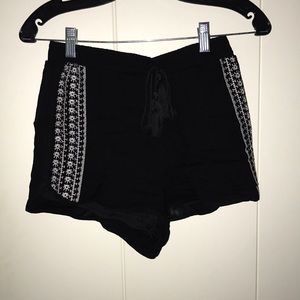 Brand new, black with white embroidery shorts